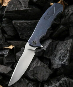 We Knife Co. We Knife Kellen Bogardus 37 Framelock Folder 910B, 4.07” Bohler M390 Bead Blast Drop Point Plain Blade, Blue Titanium Handle