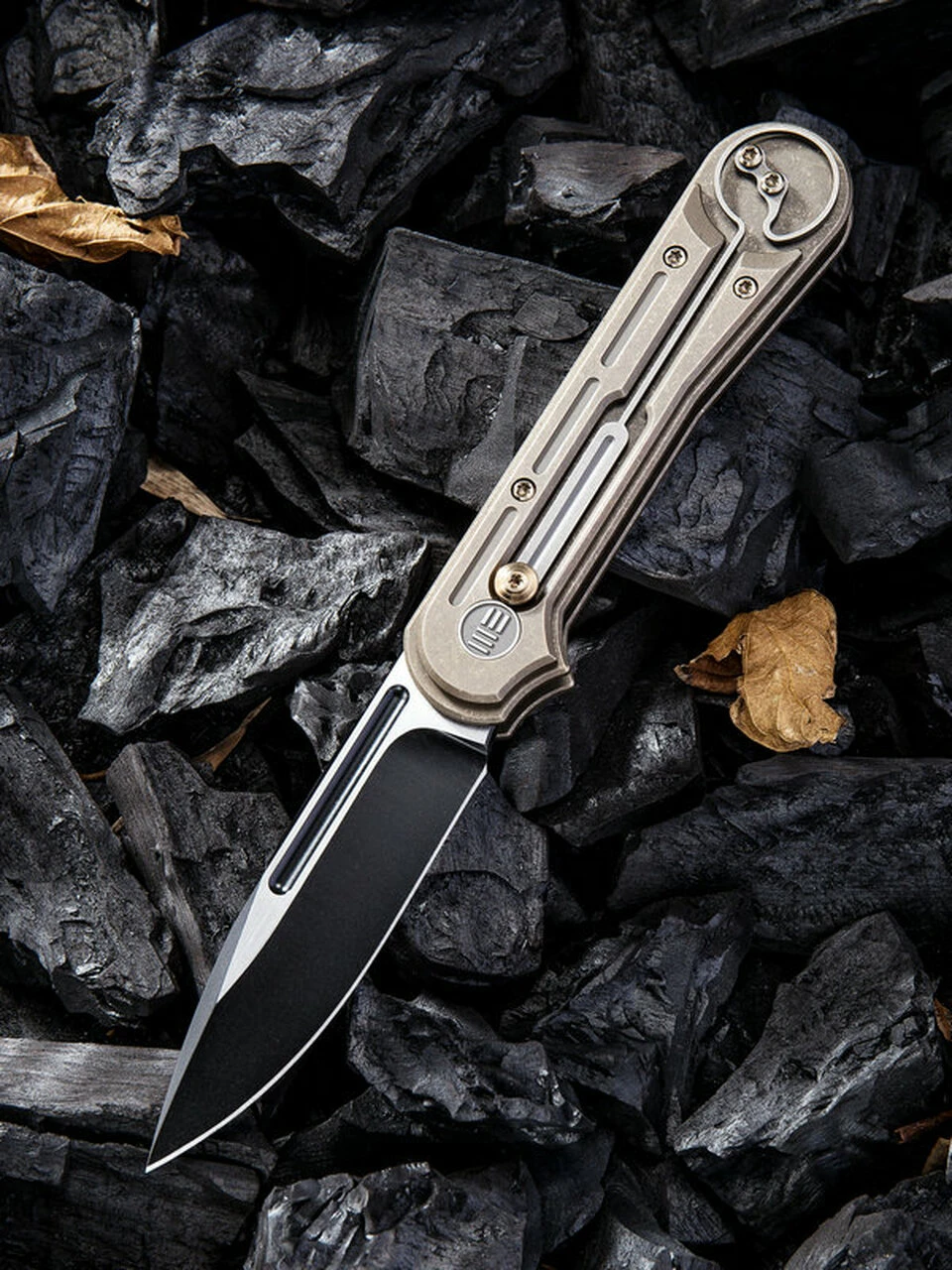We Knife Co. We Knife Double Helix Folder 815A, 3.3" CPM S35VN Black Two-Tone Drop Point Plain Blade, Bronze Titanium Handle 1 We Knife Co. We Knife Double Helix Folder 815A, 3.3" CPM S35VN Black Two-Tone Drop Point Plain Blade, Bronze Titanium Handle