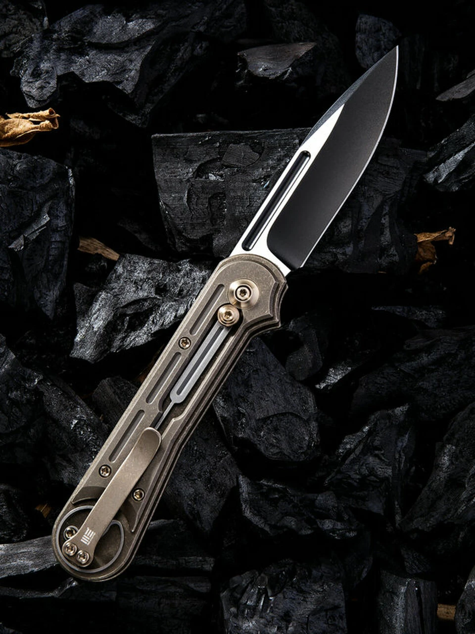 We Knife Co. We Knife Double Helix Folder 815A, 3.3" CPM S35VN Black Two-Tone Drop Point Plain Blade, Bronze Titanium Handle 2 We Knife Co. We Knife Double Helix Folder 815A, 3.3" CPM S35VN Black Two-Tone Drop Point Plain Blade, Bronze Titanium Handle - Image 2