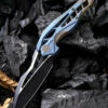 We Knife Co. We Knife Arrakis Framelock Folder 906B, 3.45” Bohler M390 Black Wharncliffe Plain Blade, Blue and Bronze Stonewash Titanium Handle