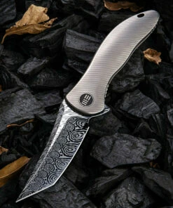 We Knife Co. We Knife Synergy 2 Framelock Folder 912DS2, 3.49" Heimskringla Damasteel Tanto Plain Blade, 6AL4V Titanium Satin Polished Grooved Handle