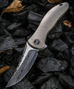 We Knife Co. We Knife Synergy 2 Framelock Folder 912DS1, 3.49" Heimskringla Damasteel Trailing Point Plain Blade, 6AL4V Titanium Satin Polished Grooved Handle