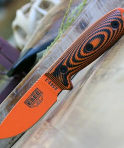 ESEE Knives ESEE-3 3PMOR-006, 3.88" 1095 Carbon Steel Orange Plain Blade, Orange/Black G10 3D Handle, Black Sheath