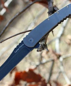 Ontario 8875 Carter Prime, 3.4" D2 Plain Blade, Titanium Handle