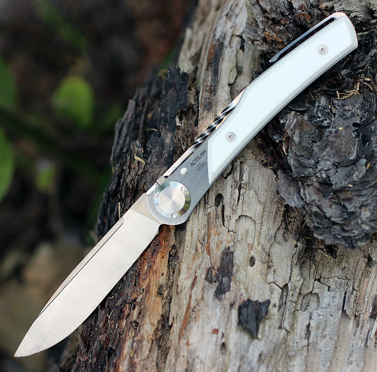 Actilam T3CC White Corian Folder with Clip, 3.25 in. X50CrMoV15N Plain Blade 1 Actilam T3CC White Corian Folder with Clip, 3.25 in. X50CrMoV15N Plain Blade