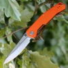 Artisan Cutlery Artisan Zumwalt ATZ1808POEF, 3.94" D2 Plain Blade, Flat Orange G-10 Handle