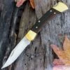 Buck Knives Buck BU110FG Folding Hunter, 3.75" 420HC Plain Blade, Finger Grooved Woodgrain Handle, Leather Sheath