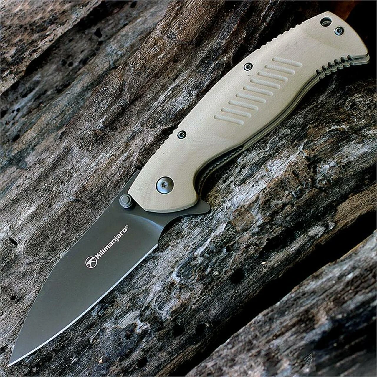 Kilimanjaro, 910028, Morsa flipper, 3.5 in. Drop Point Titanium Coated Blade, Tan Handle 1 Kilimanjaro, 910028, Morsa flipper, 3.5 in. Drop Point Titanium Coated Blade, Tan Handle