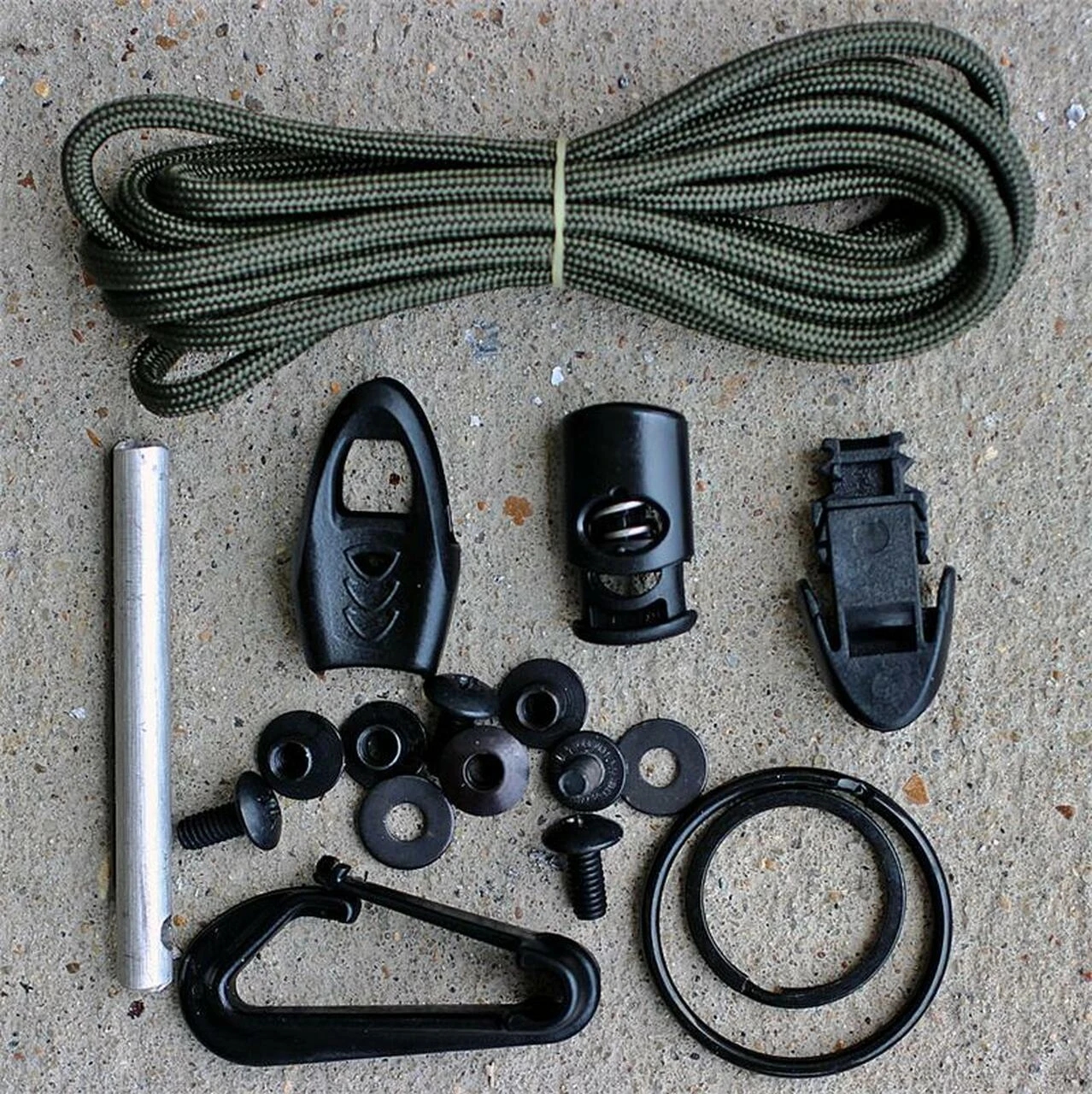 ESEE Knives Izula Complete Survival Kit (Includes: Paracord, Rings, Fire Rod, Whistle & Clip Plate) 1 ESEE Knives Izula Complete Survival Kit (Includes: Paracord, Rings, Fire Rod, Whistle & Clip Plate)
